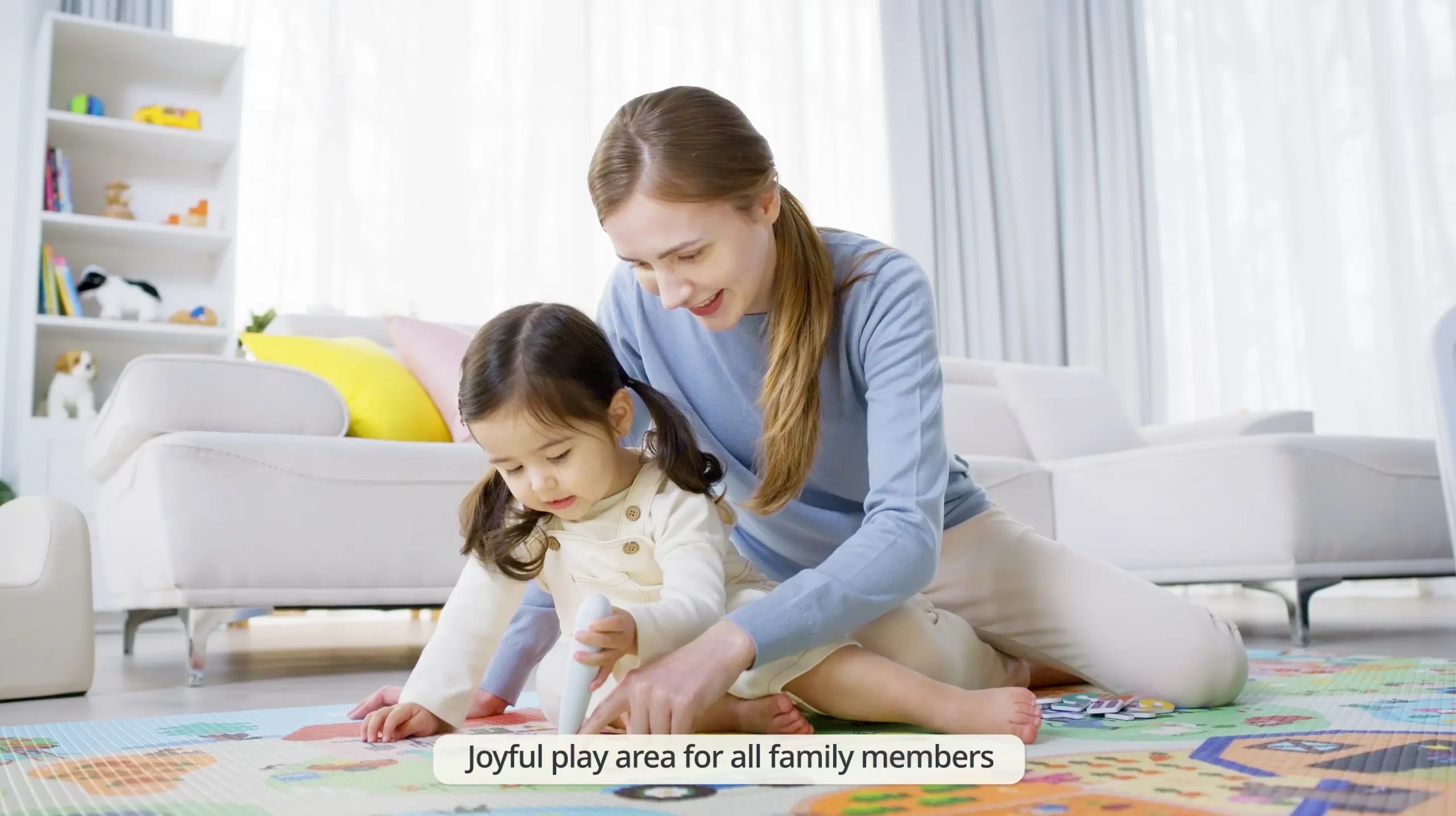 Parent and child using the Dwinguler Sensory Playmat
